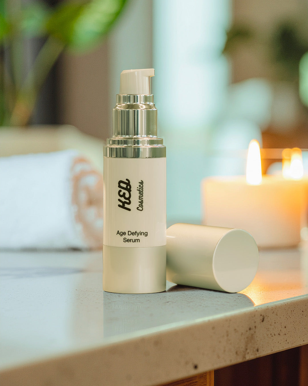 Age Defying Serum bottle on a countertop showcasing age defying serum benefits for youthful skin.